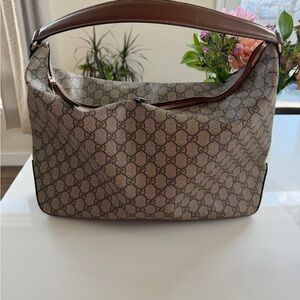 Gucci GG Supreme coated canvas and leather hobo bag